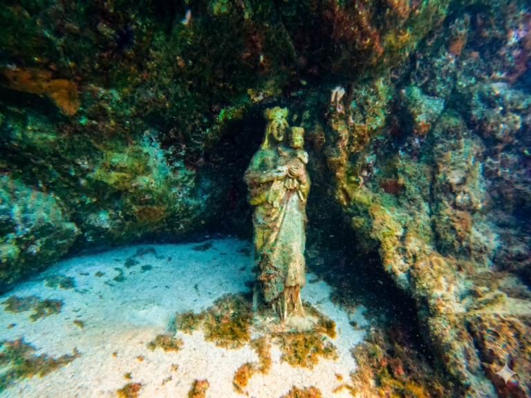 statue in Montaña amarilla in costa silencio tenerife, seen by divers on a guided dive arranged by diving atlantis